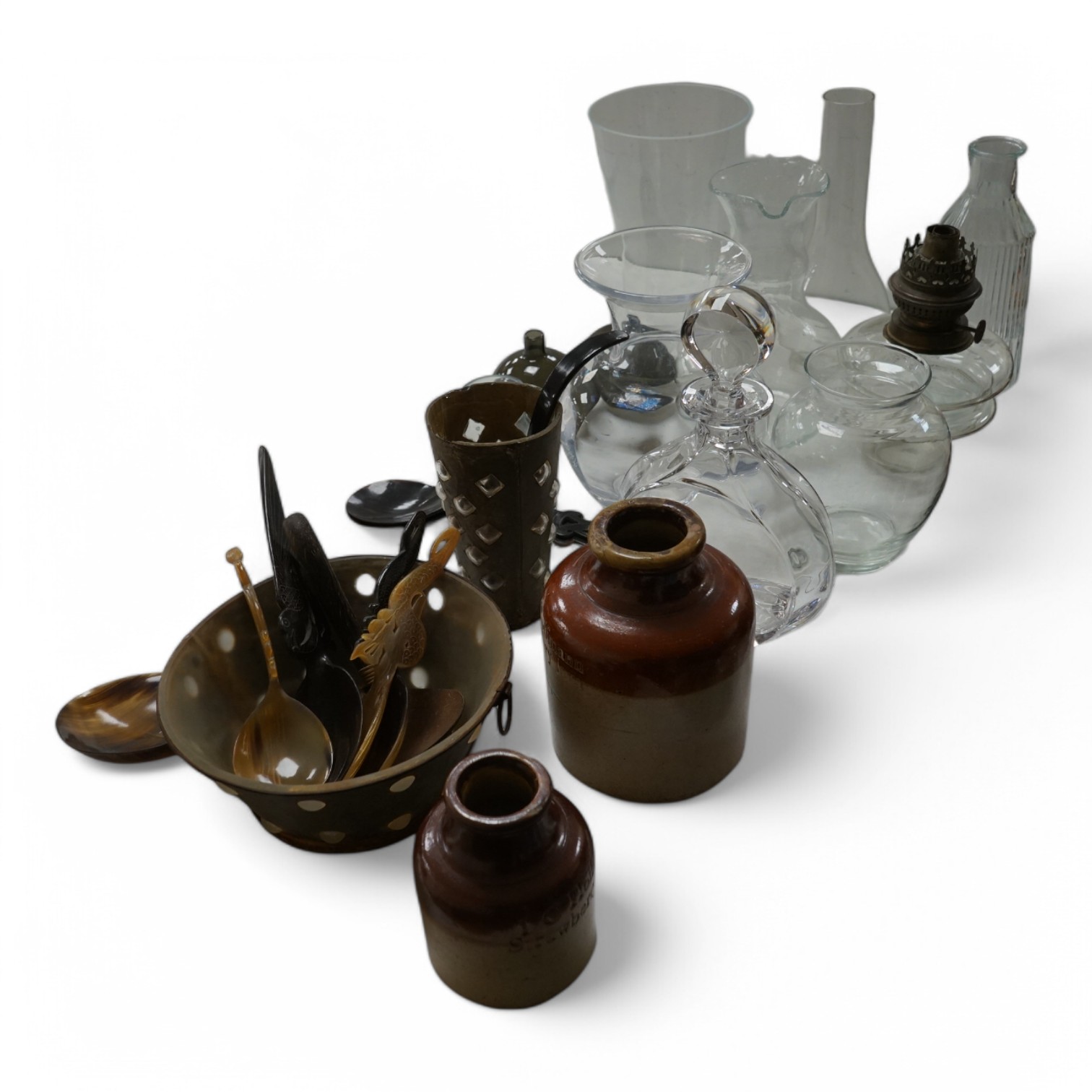 Sundry items to include two 19th century stoneware jars, ''I C Hoffman Strawberry Jam'' & ''I C Hoffman Rassberry Jam glassware, and a quantity of Indonesian carved horn or coconut spoons, largest 25cm high. Condition -